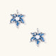 Blue denim fabric star-flower stud earrings with white pearl center and crystal accents on white gold-plated frame